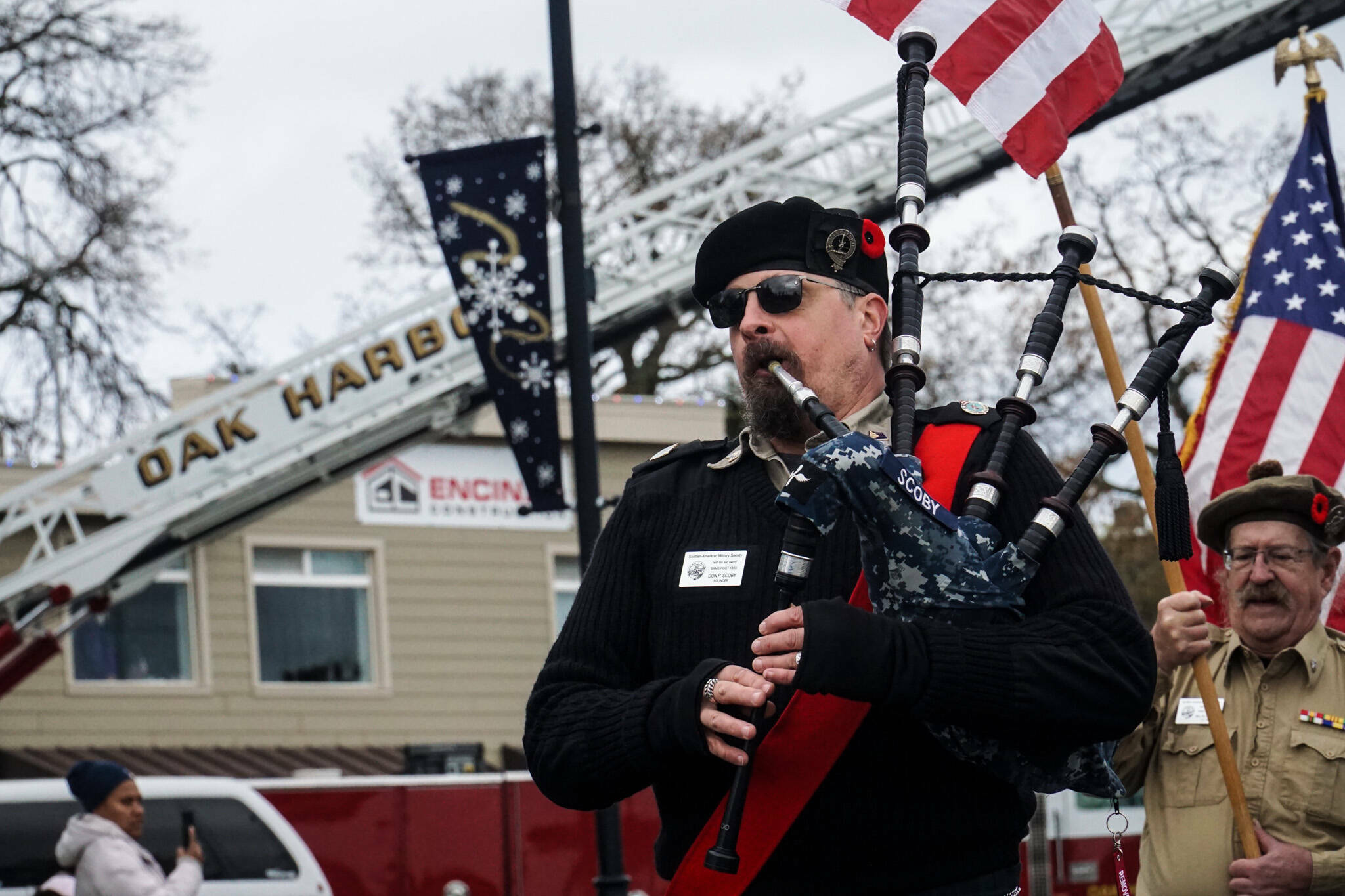 Photo by Sam Fletcher
Don Scoby, author of The Shanty Piper plays at the Veterans Day Parade in Oak Harbor.