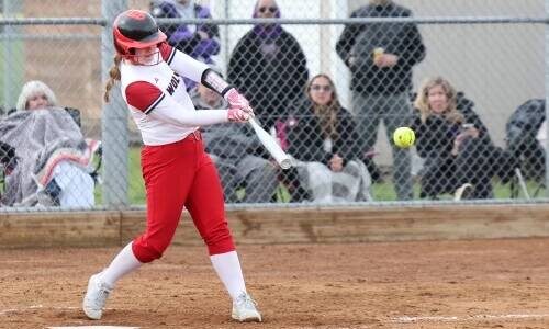 Photo by John Fisken

Chelsi Stevens blasts a big-time hit.