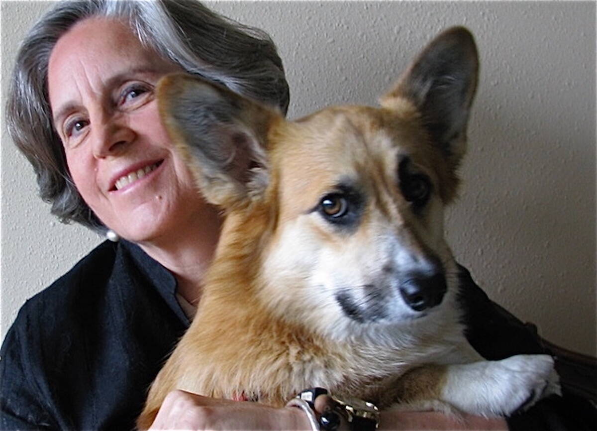 Christina Baldwin holds her corgi, Gracie.
