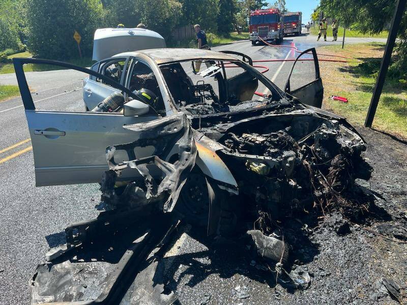 Fortunately, no one was injured in a two-car crash earlier this week in Freeland that resulted in the total loss of this car that caught on fire. (Photo by South Whidbey Fire/EMS)