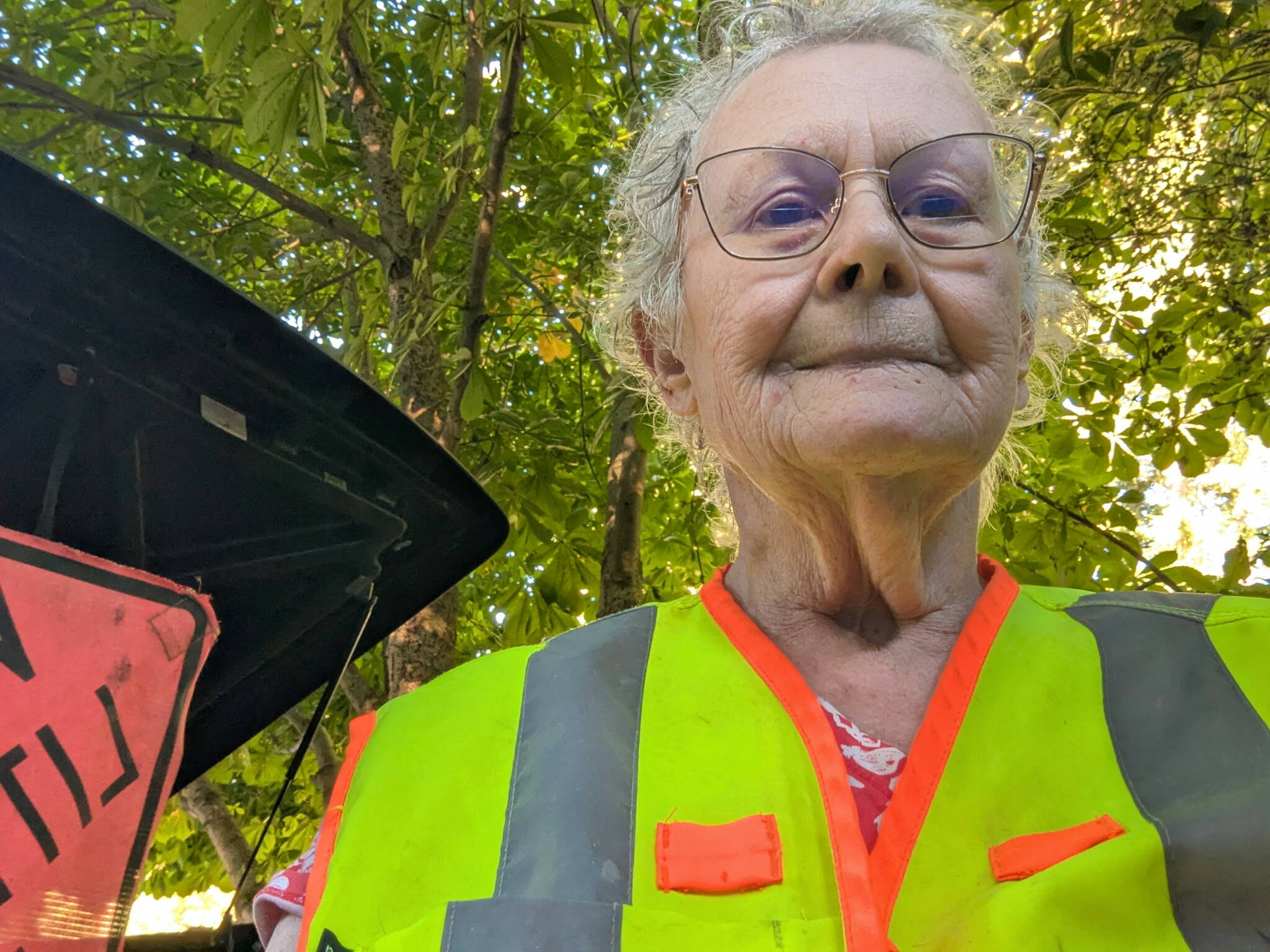 Madeline Rose takes a selfie in her road-cleanup vest (Photo provided)