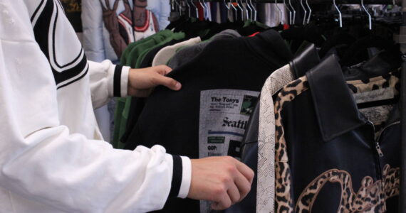 Ronning peruses the selection at Stay Original Market. Photo by Allyson Ballard