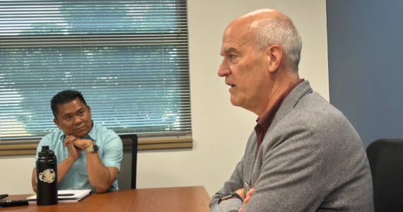 Rick Larsen during conference call with Clinton