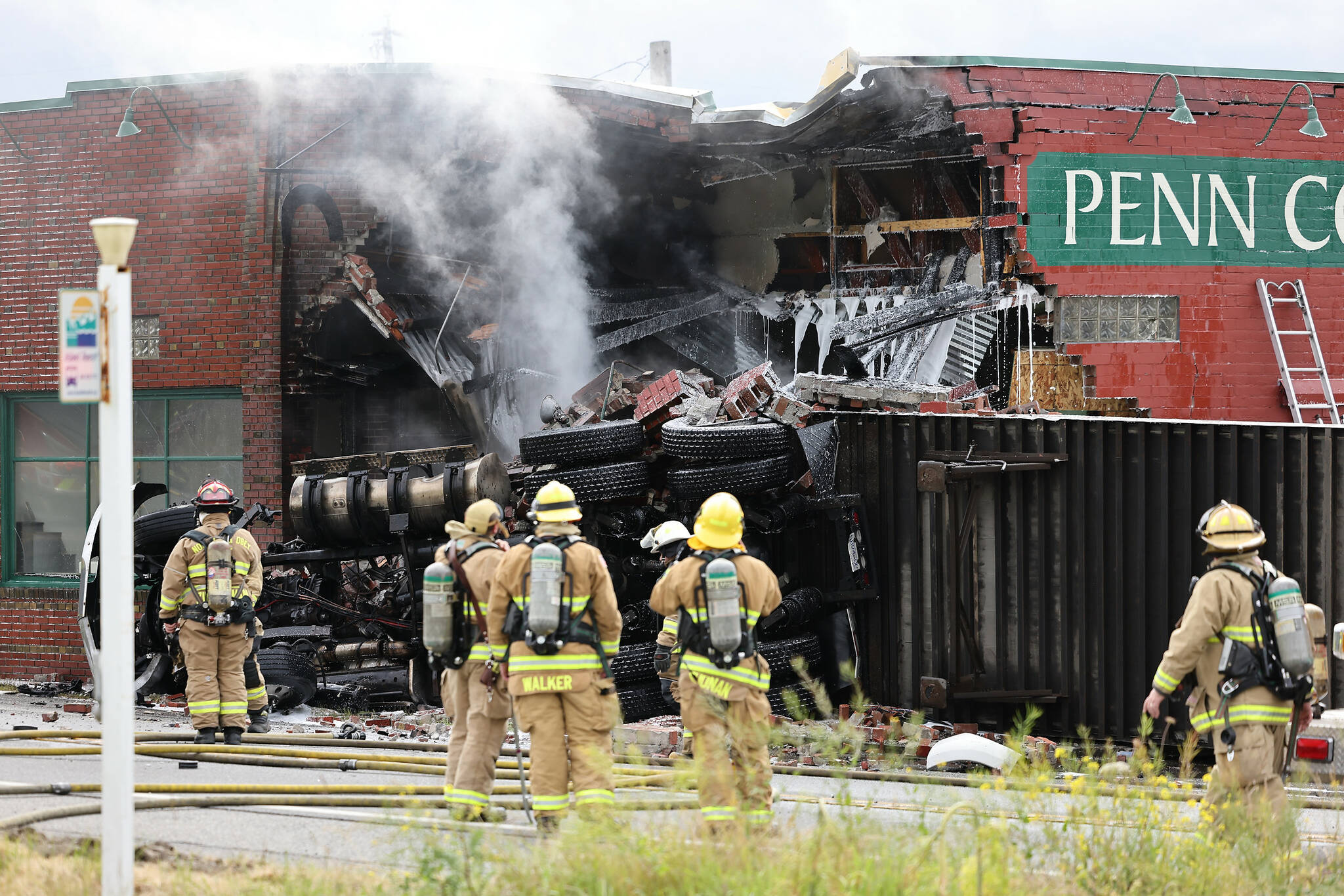 (John Fisken file photo) A semi truck crashed into Penn Cove Pottery and caught on fire in 2022.
