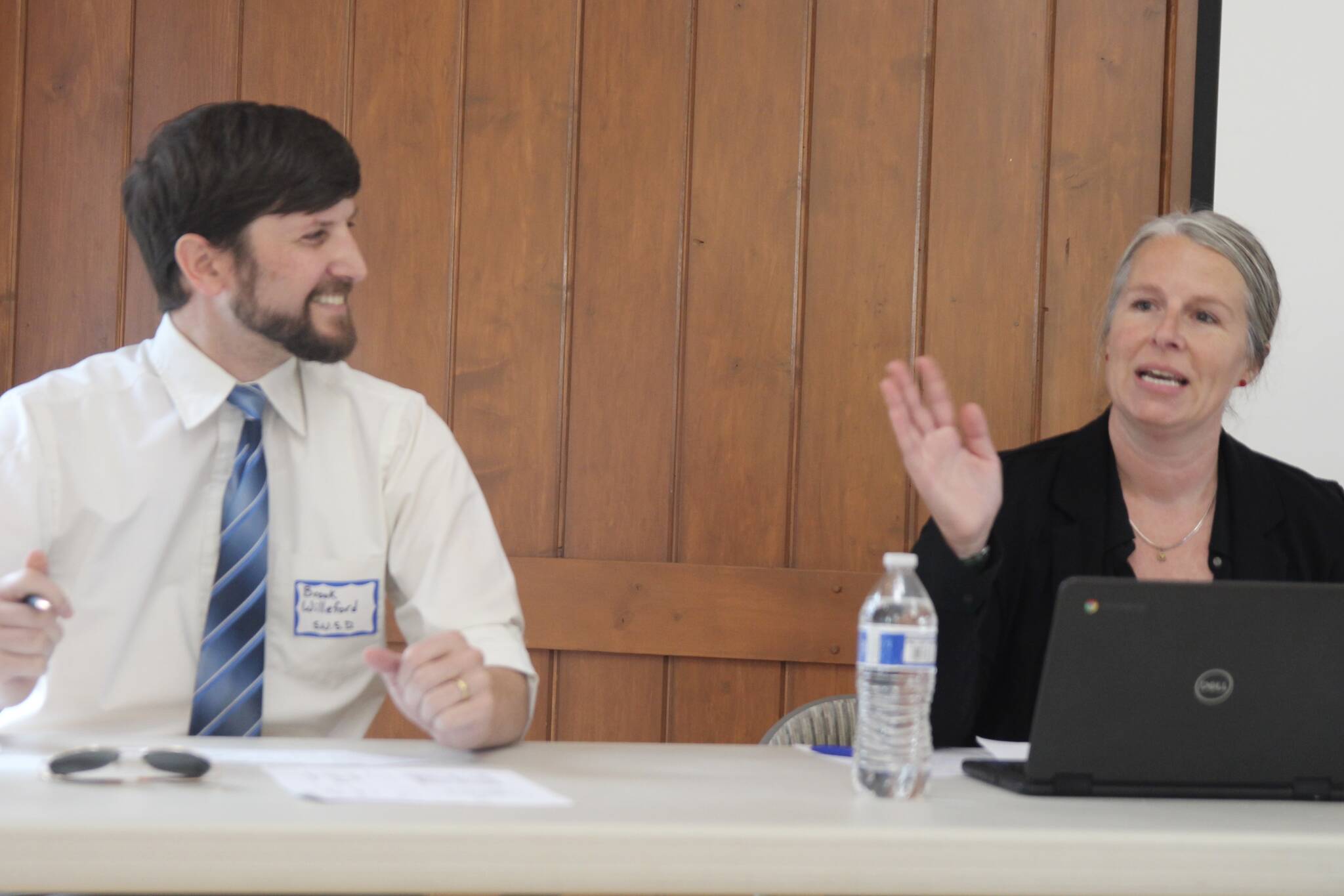 School board presidents Brook Willeford from South Whidbey school district and Morgan White from Coupeville school district discuss funding needs. (Photo by Marina Blatt)