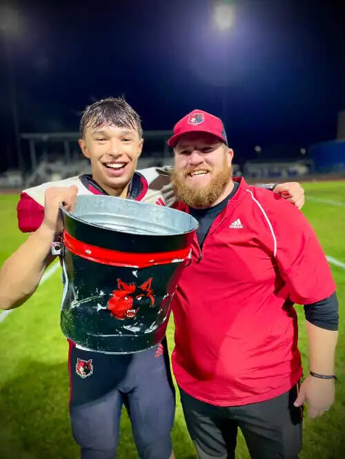Liam Blas, at left, and Bennett Richter are part of a pack of Wolves bringing The Bucket back to Coupeville. (Kevin Blas photo)