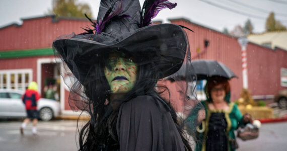 At least 150 witches signed up to walk in the event in what appears to be the beginning of a new Halloween tradition in town. (Photo by David Welton)
