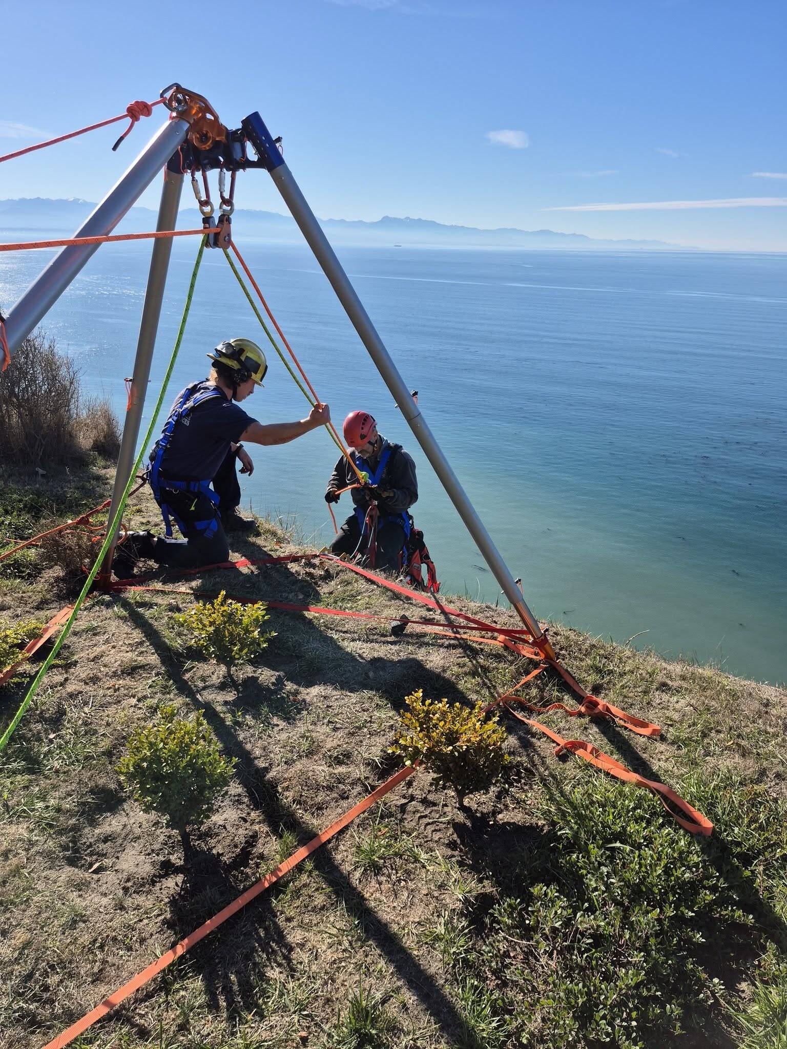 (Photo provided) A fire captain rapelled 100 feet down to save the dog.