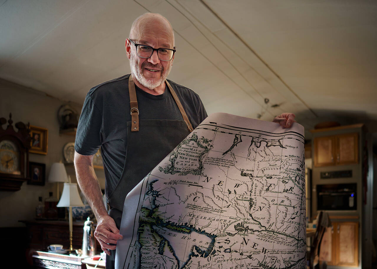 (Photo by David Welton)	Paul McClintock creates historical ephemera with painstaking accuracy from his Clinton-based studio.