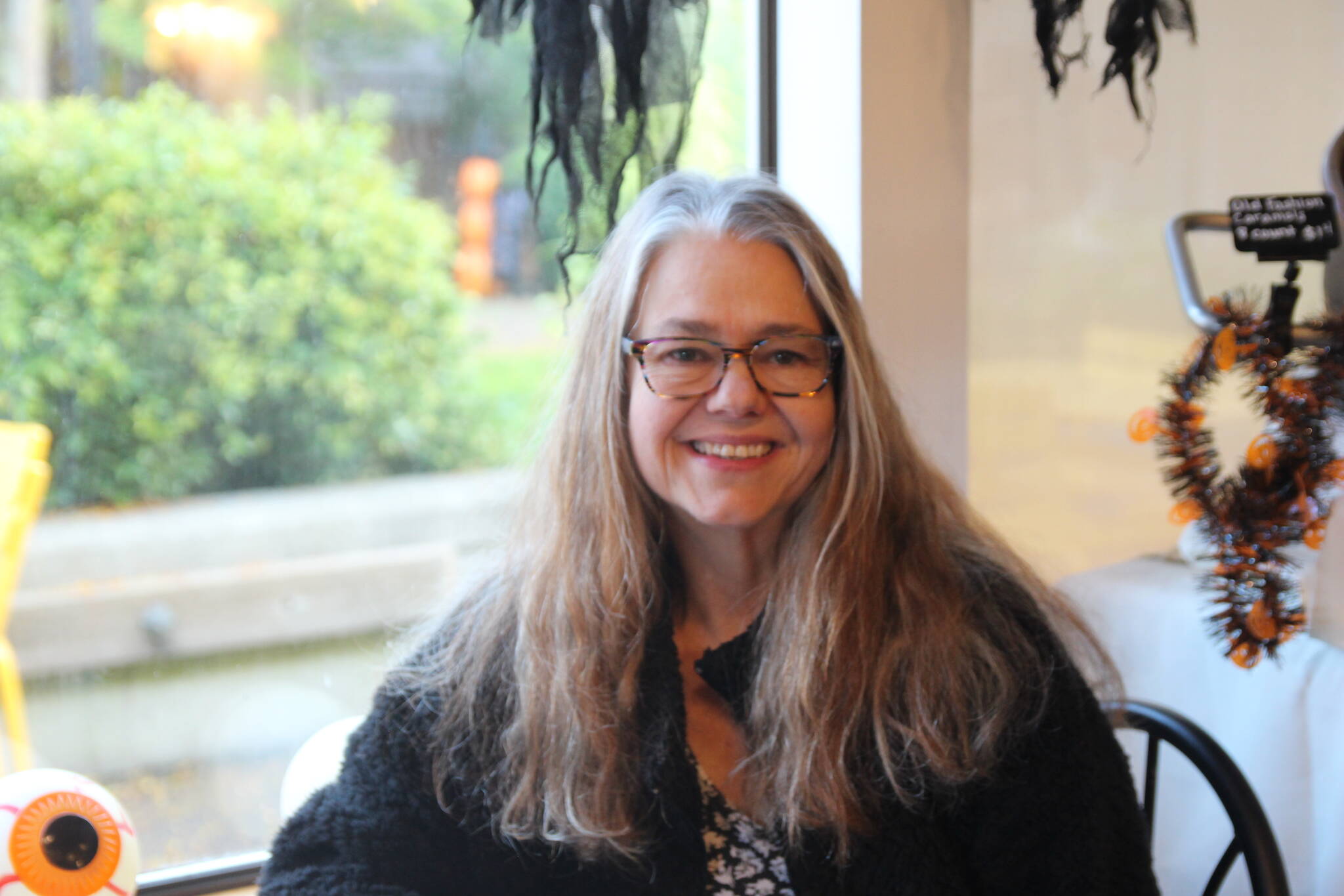 Ramona Newbauer smiles inside her store, Sweet Mona’s.