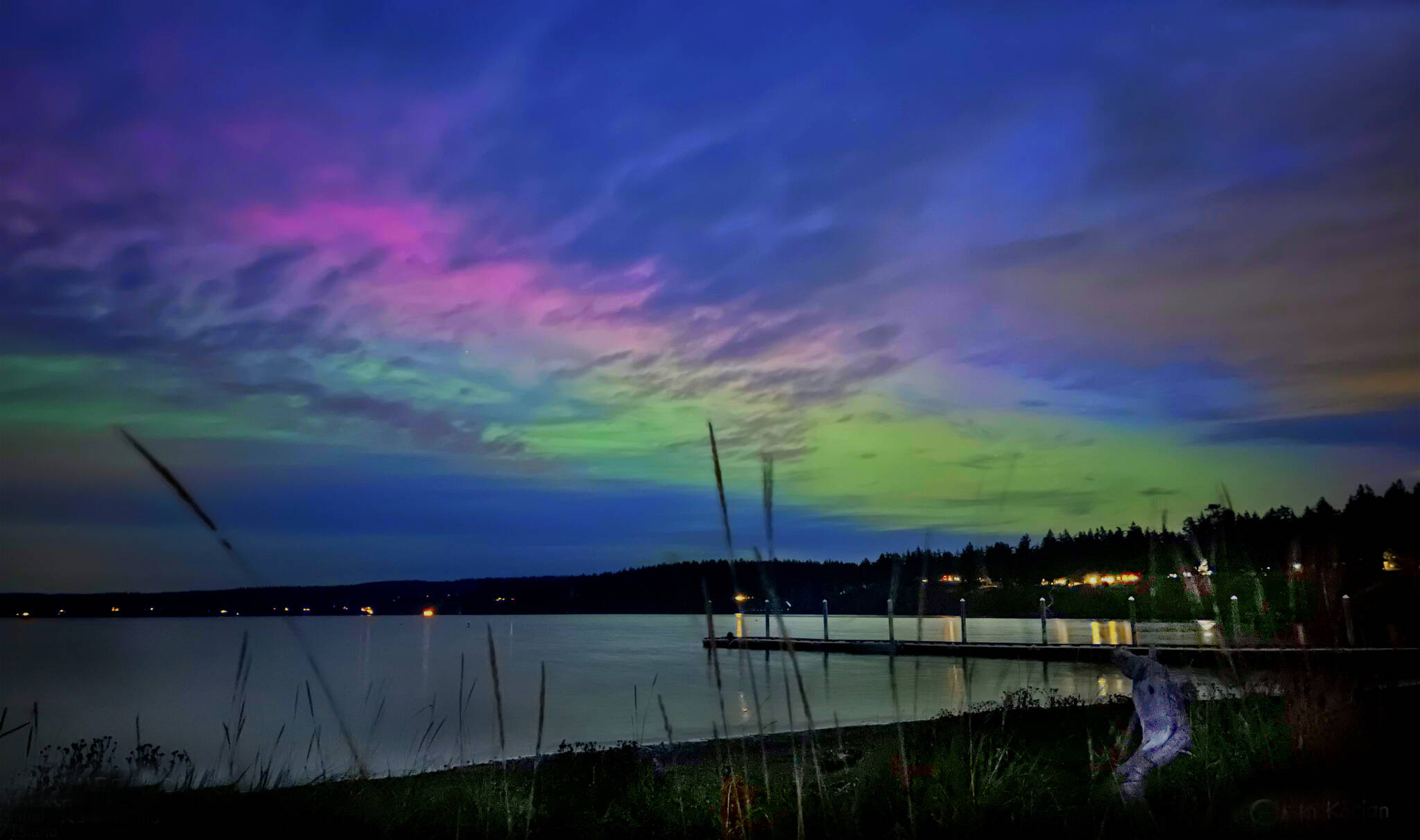 Whidbey resident Jan Kocian captured the glowing skies above Holmes Harbor in this photo.