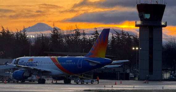 Photo provided
A plane is parked at the Bellingham International Airport in front of a surreal Washington sunset.