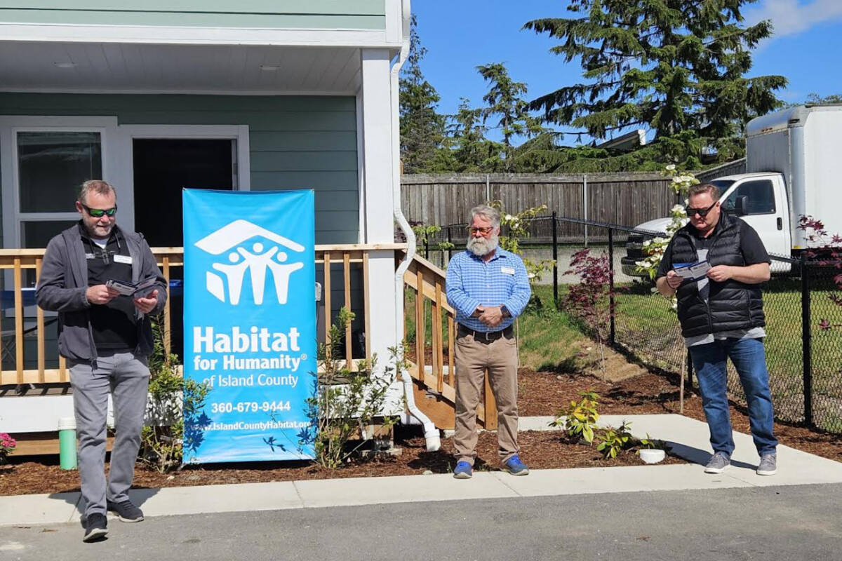From left: Orin Kolaitis - CEO, Scott Givens – Chief Program Officer, Mayor Ronnie Wright – Oak Harbor at a home dedication. Photo courtesy Habitat for Humanity of Island County