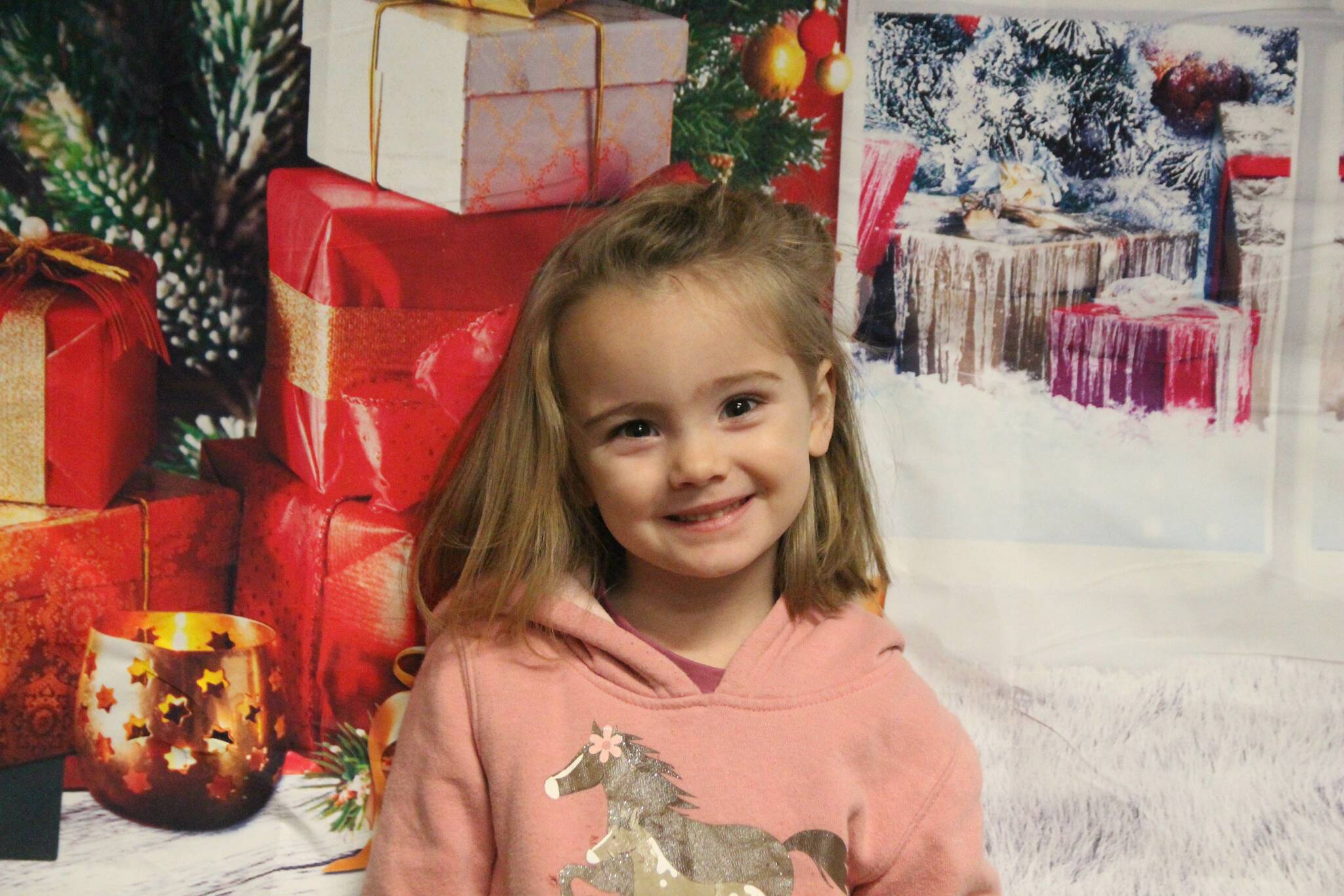 (Photo by Marina Blatt) Addison (Addy) Taylor, age four, said she wants more toys from Santa.