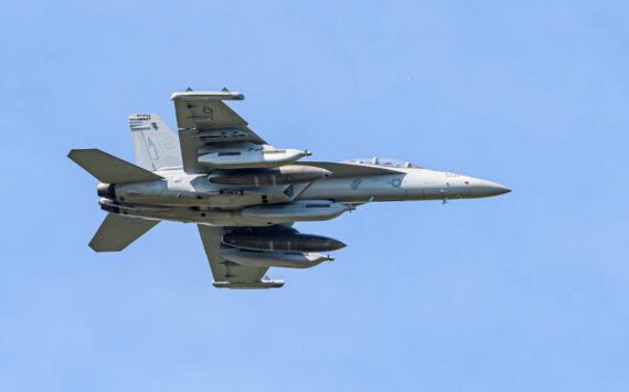 Photo by Joe Kunzler
An EA-18G Growler with jamming pods flies over Whidbey Island.