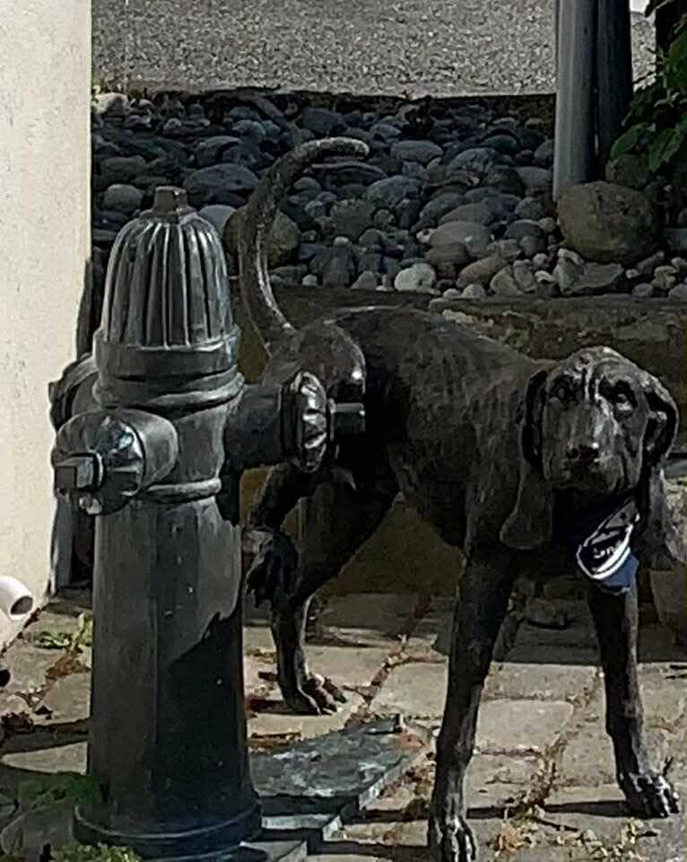 Photos provided
Two heavy bronze statues that were bolted to the concrete outside the Coupeville Chamber of Commerces visitor center were stolen on Dec. 19.