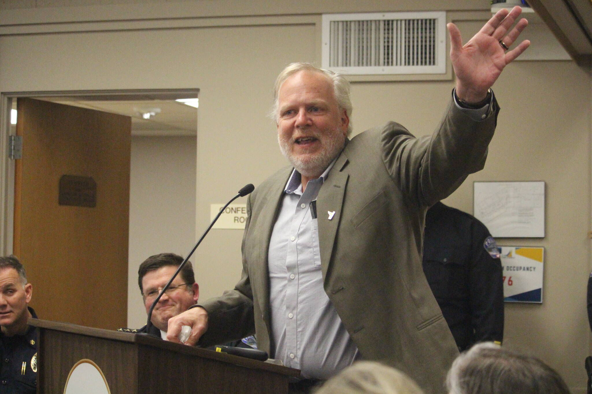 Photo by Marina Blatt
Jim Woessner bids adieu during his final meeting on the city council.