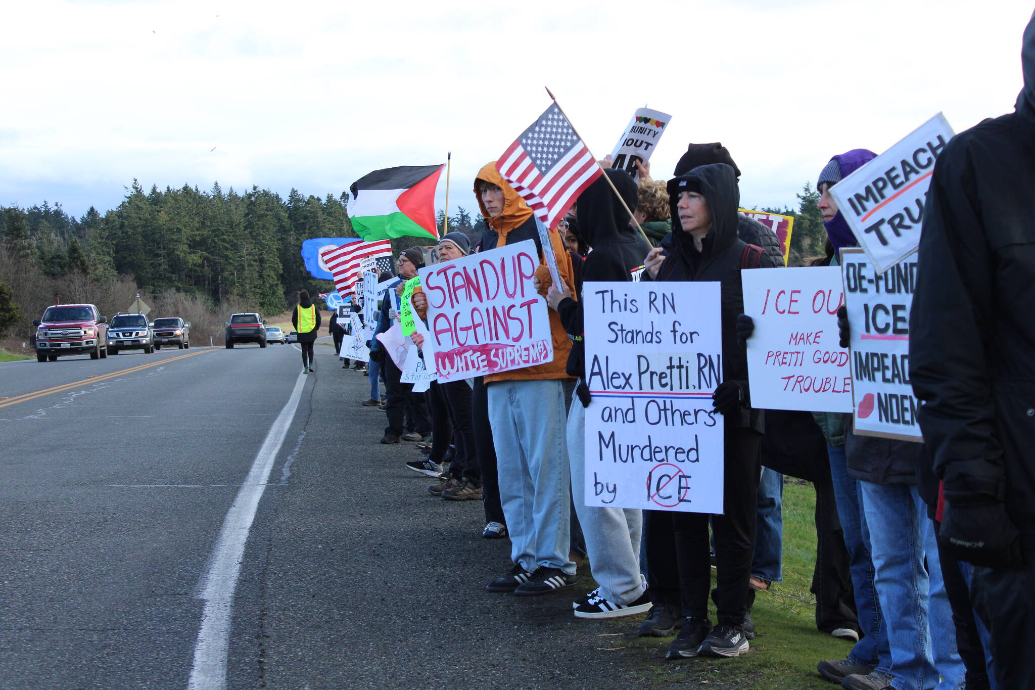 (Photo by Allyson Ballard) Hundreds of demonstrators gathered in Coupeville last week to protest ICE and to honor those affected by the federal agencys actions in recent months.
