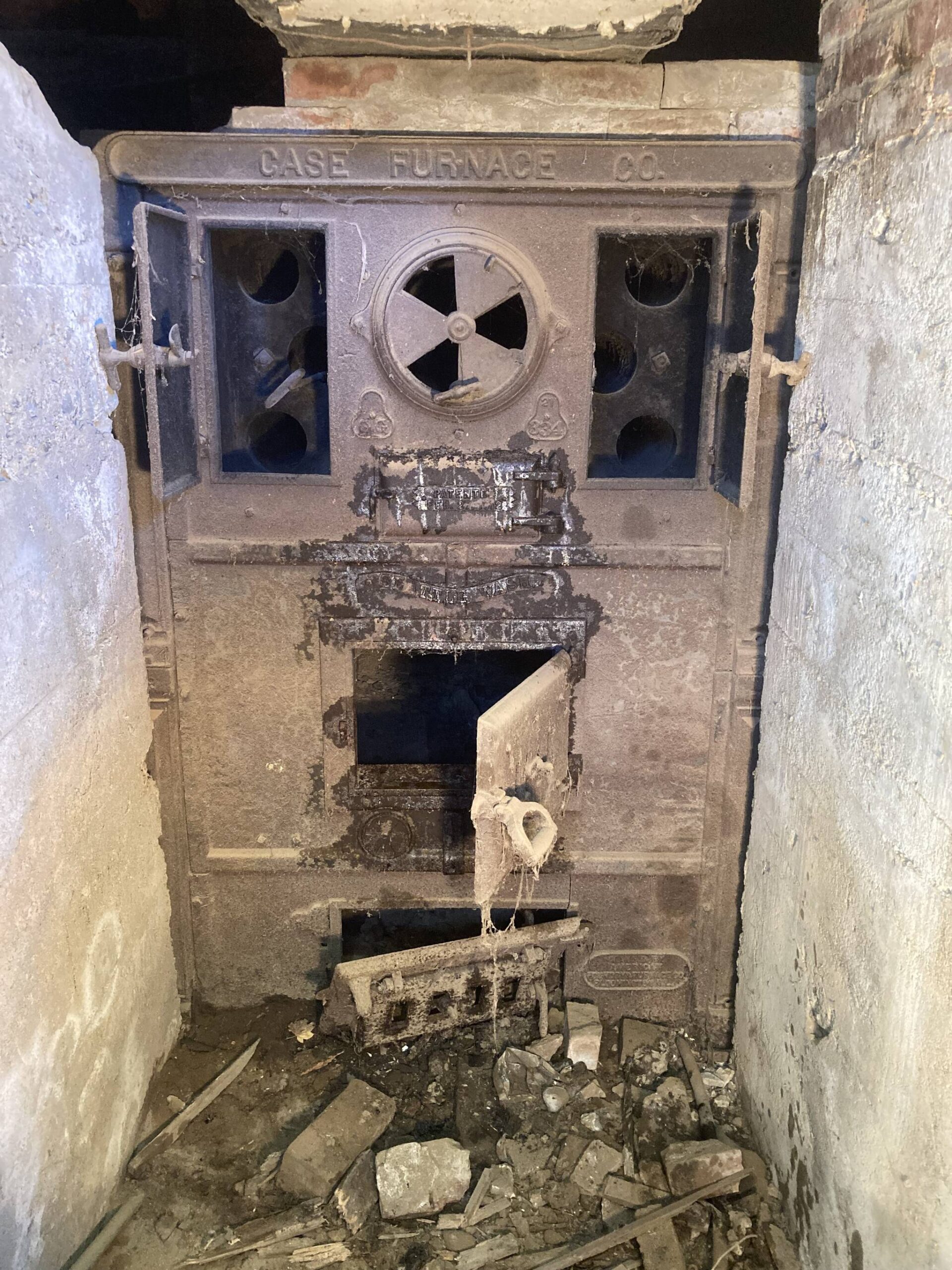 Photo by David Stern. Believed to be manufactured in 1912, this coal-burning furnace was recently discovered beneath the Pole Building.