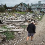 Photo by Ian Terry / The Herald                                Cliff Marston walks to his house located on Camano Island&rsquo;s Iverson Road on Sept. 7.