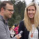 Conor Laffey, left, the communications officer for Oak Harbor Public Schools, interviews Oak Harbor City Councilwoman Erica Wasinger during the first day of school Sept. 6, 2016, at Hillcrest Elementary School.