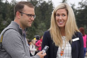 Conor Laffey, left, the communications officer for Oak Harbor Public Schools, interviews Oak Harbor City Councilwoman Erica Wasinger during the first day of school Sept. 6, 2016, at Hillcrest Elementary School.