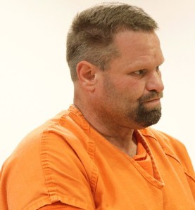 The order of dismissal of all charges against Douglas L. Blackburn