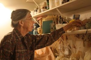 Flo Simenson shows the different materials she uses to create her works of art. She said she has materials and equipment for people to use for free