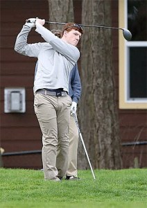 Mason Dieter fires a shot for Oak Harbor in its match Monday.