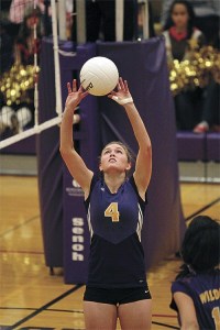 Taylor Nienhuis sets for Kayleigh Harper in the district tournament. Nienhuis had 54 assists and Harper 23 kill in two matches.