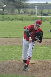 Coupeville's Aaron Curtin fires a pitch against Cedarcrest Wednesday. The sophomore threw a complete game in the 3-1 loss.