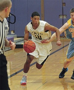 Oak Harbor's Gabe Groenig flies by the Everett defense Tuesday.