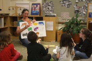 Charlynn Anema-Raimundi leads a preschool-age Head Start class Thursday afternoon.
