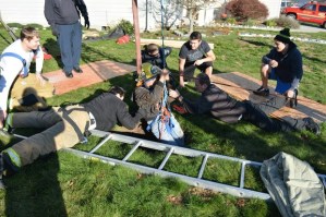 Firefighters rescue an Oak Harbor man who fell down an abandoned well Saturday morning.