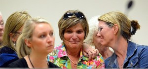 Mary Jo Keil and friends react to a ruling in Island County Superior Court Thursday.