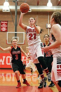 Mia Littlejohn hits a floater for Coupeville in Friday's win.
