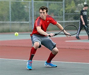 Sebastian Davis shoots a backhand in his win Friday.