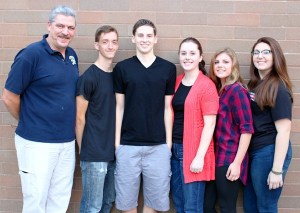 The Oak Harbor High School NJROTC Color Guard will appear at Sunday’s Mariners game at Safeco Field. Left to right: instructor William Thiel