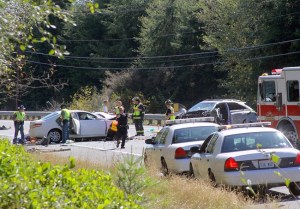 Washington State Patrol investigates the accident scene Thursday on State Highway 525 near Admiral’s Cove.
