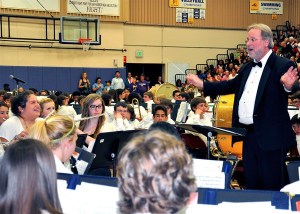 Bruce Lantz leads his band at a recent concert. He is retiring after 31 years.