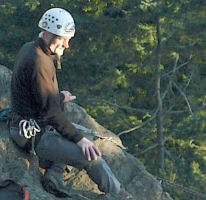 Dallas Kloke helps another unidentified climber scale Mount Erie in April of 2008. Kloke