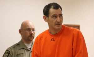 Joshua Adams appears in Island County Superior Court Wednesday after allegedly leading deputies on a chase down Whidbey Island. He’s suspected of killing his father in Whatcom County.