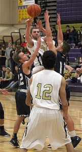 Sean Erskine fires a jump pass to Ozell Jackson