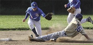 Clay Doughty steals second in Oak Harbor's 12-2 win over Sedro-Woolley.