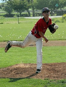Hunter Smith shoots a strike in his pitching win over Port Townsend.