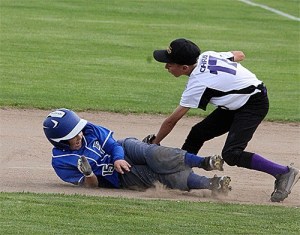 North Whidbey first baseman Chris Shashaty tags out a South Whidbey runner during a rundown Friday.