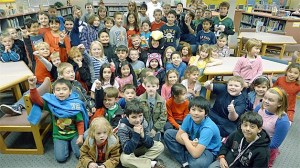 Hillcrest Elementary School Principal Paula Seaman dressed up as a penguin and celebrated a successful PTA fundraiser with some of the students.
