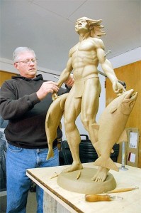 Oak Harbor artist Wayne Lewis puts some finishing touches on a bronze he is creating for downtown. Although he worked on the project for months he withdrew his proposal in the wake of tribal concerns.