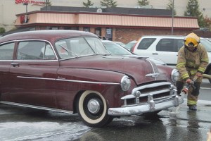 The Oak Harbor Fire Department makes quick work putting out a minor car fire off of Highway 20 in Oak Harbor.
