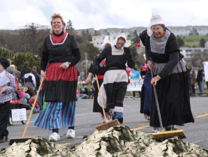 Members of the Dutch Mafia sweep up ill-begotten money on the mean streets of downtown Oak Harbor.
